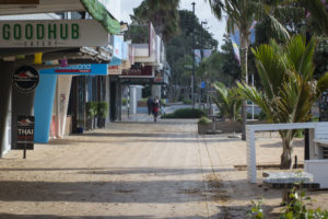 New Zealand and Covid 19 Towns Are Dead as this photo of a normally bustling cafe sidewalk shows.